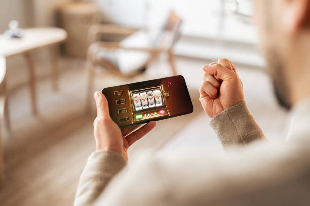jackpot play mobile app interface showing live casino tables and sportsbook menu